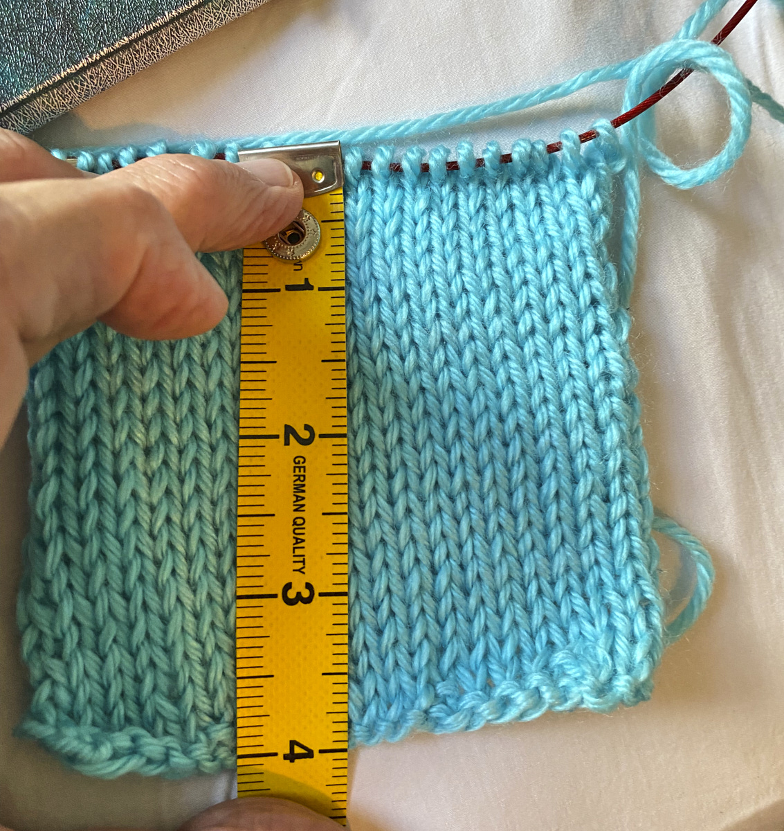 knit swatch for blue sweater