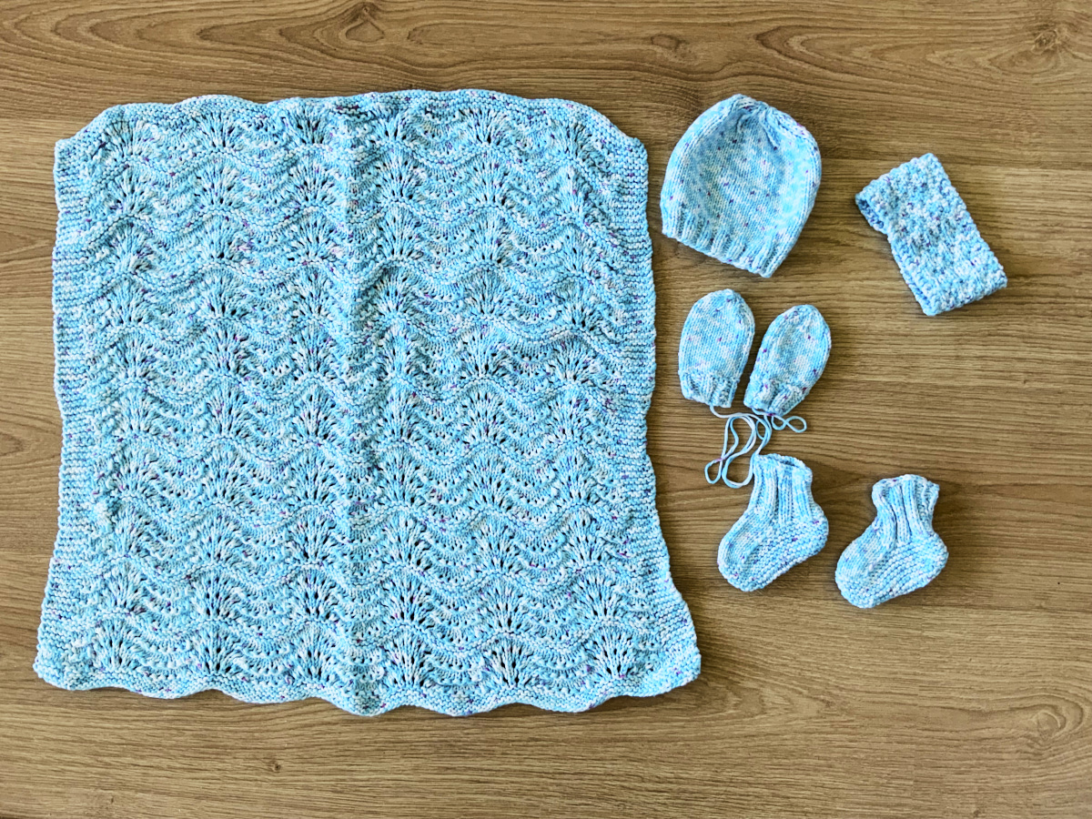 Baby blanket and hat, mitts, shoes and headband