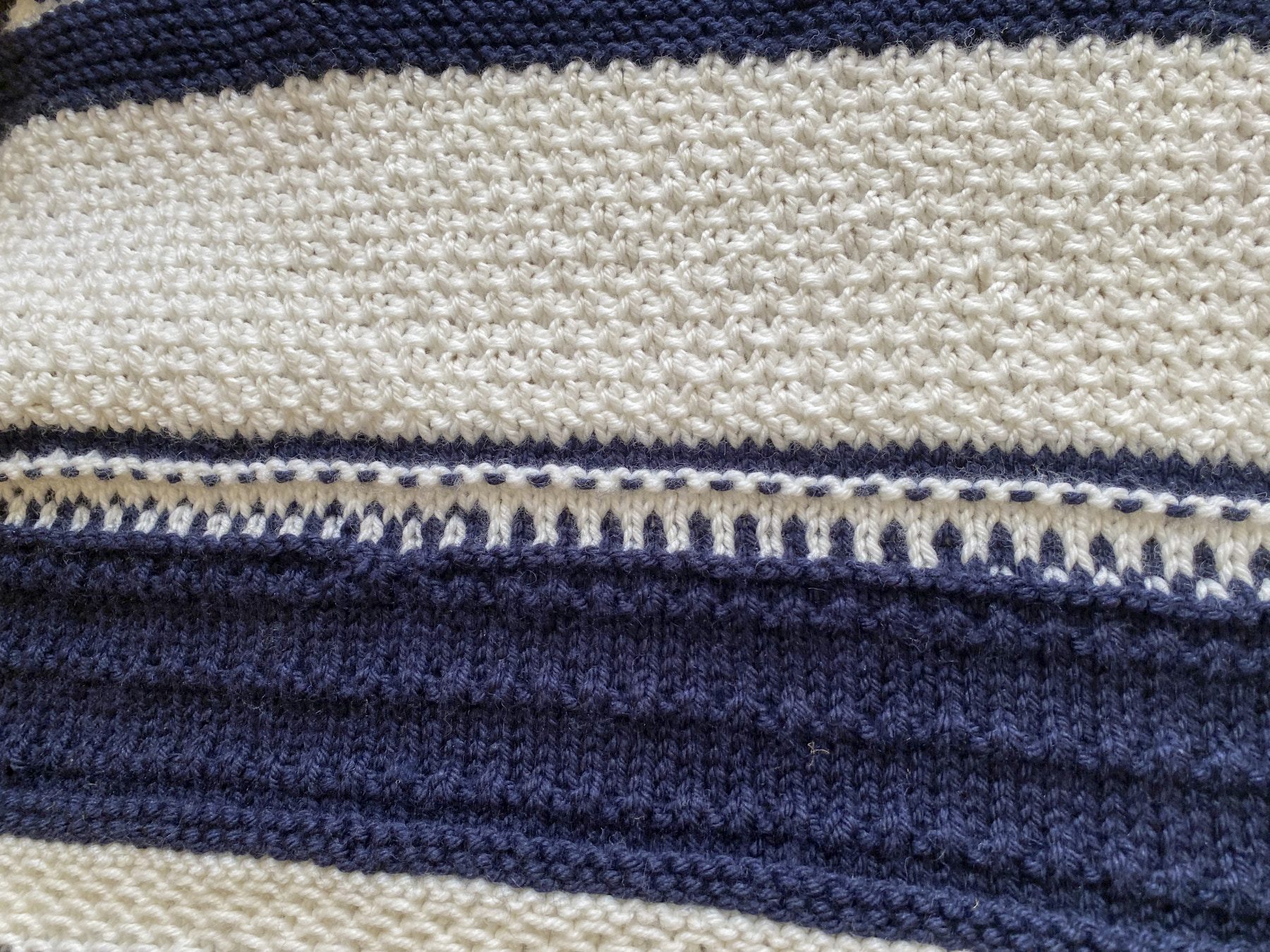 detail of stitches on the improvised blanket