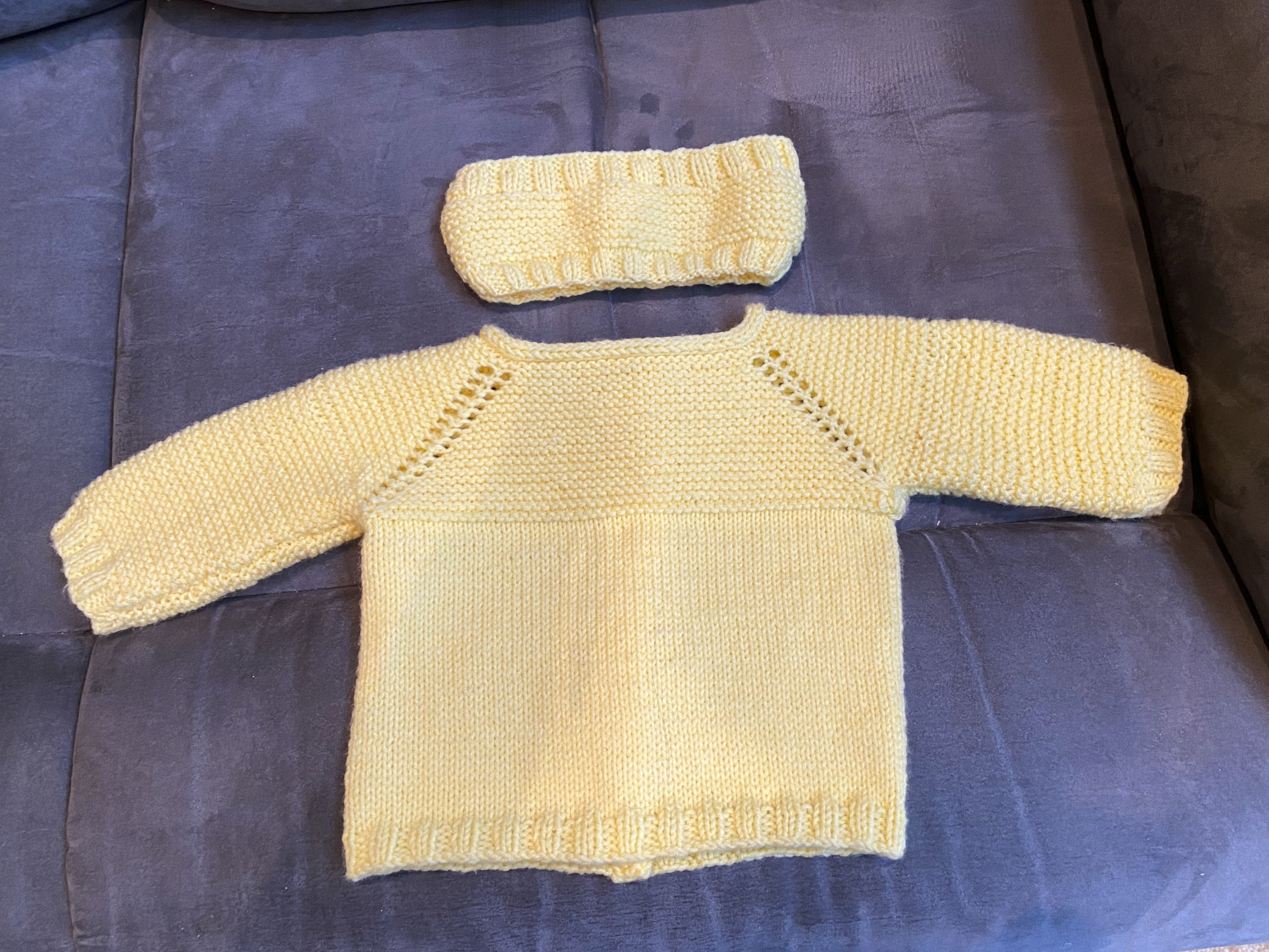 Kay's yellow baby sweater and hat
